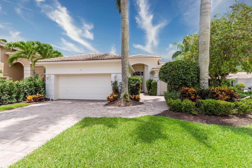 Photo of 61 Laguna Drive, Palm Beach Gardens, FL 33418 (MLS # R10905385)