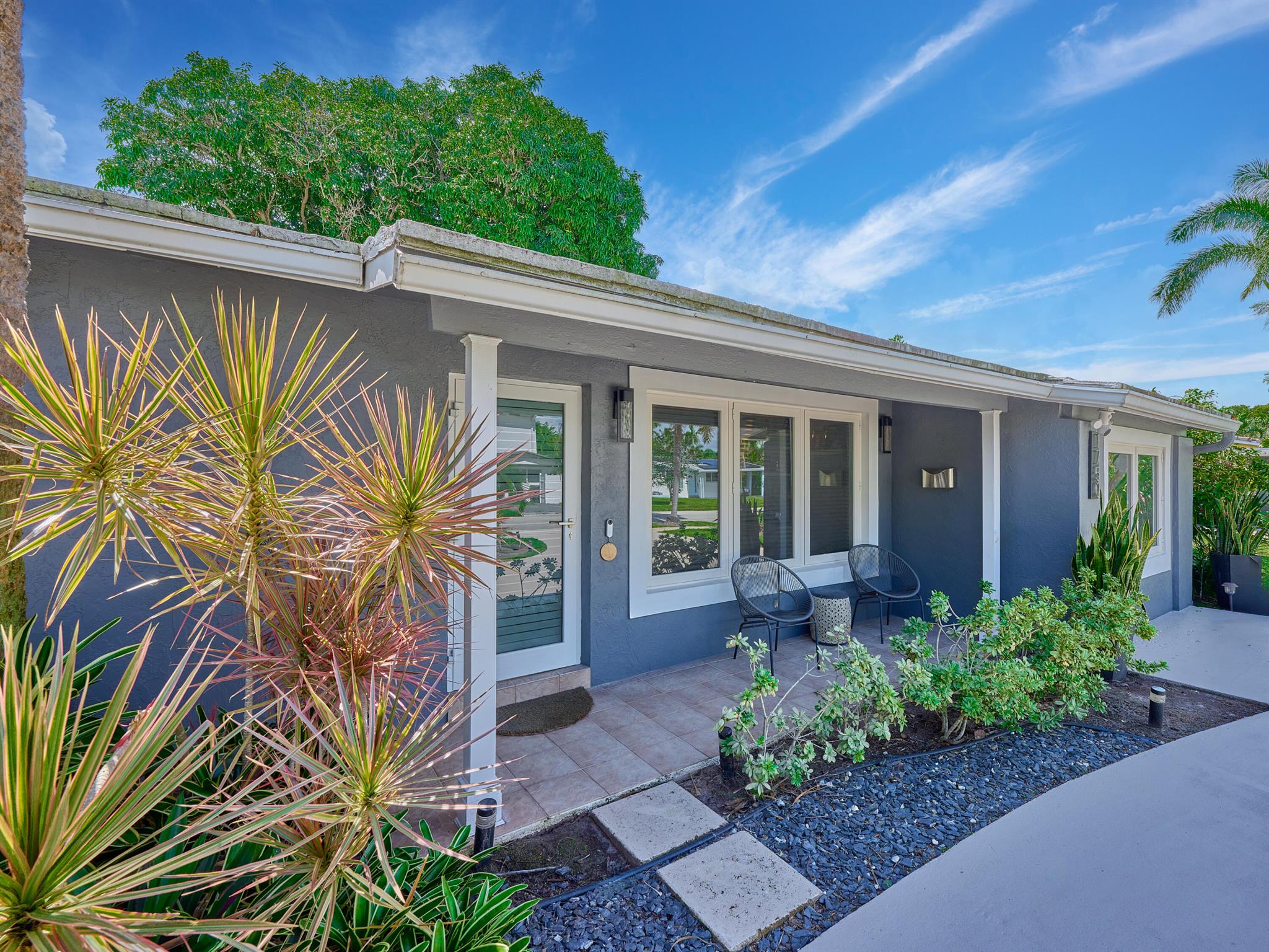 Best Priced Home in the Area - Fully Upgraded & Move-In Ready! This beautifully updated 3-bedroom, 2-bath gem sits on an oversized lot with a circular driveway and NO HOA! Step inside to find a stunning HGTV-worthy kitchen, complete with modern finishes and a layout perfect for hosting. Impact windows throughout offer peace of mind, while brand new plumbing, a new A/C, and a newer water heater provide long-term confidence. The spacious, private backyard is ideal for entertaining, relaxing, or even adding your dream pool. Located just minutes from the beach, top restaurants, shopping, and vibrant downtown -- this is South Florida living at its best! Schedule your showing TODAY!