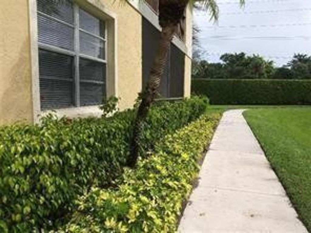 Photo of 1227 SW 46th Avenue #303, Pompano Beach, FL 33069 (MLS # B26018305)