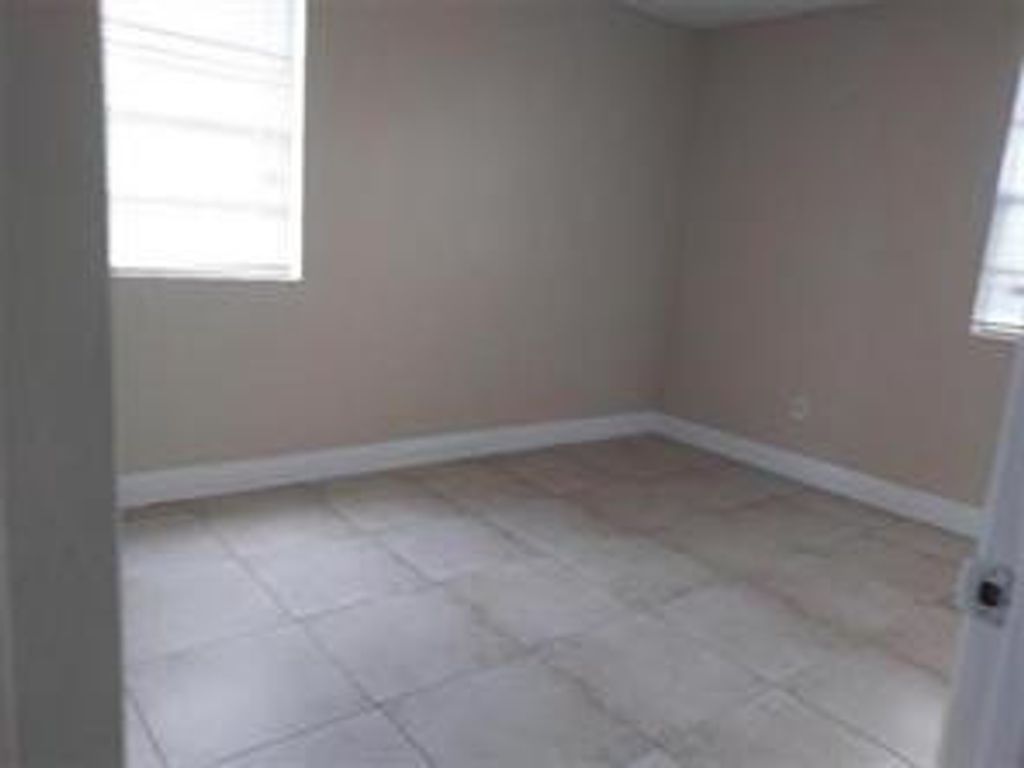 Photo of 1227 SW 46th Avenue #303, Pompano Beach, FL 33069 (MLS # B26018305)