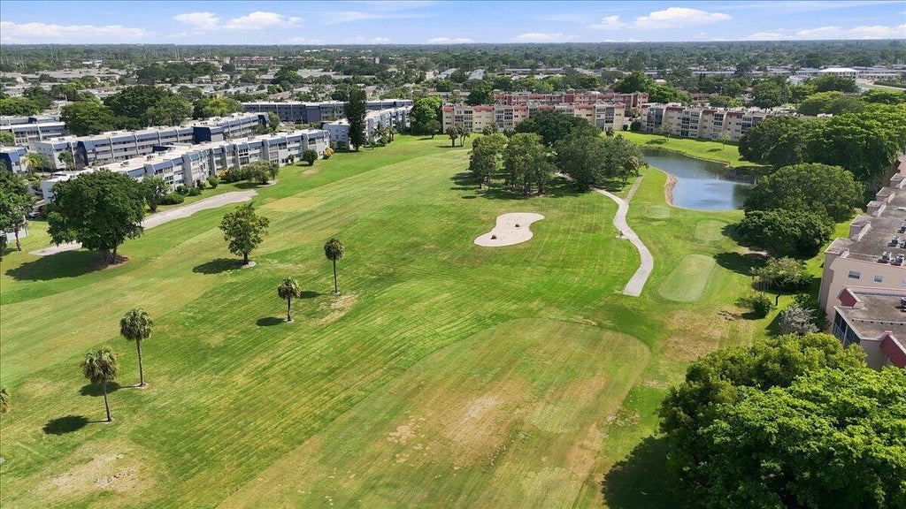 Photo of 1050 COUNTRY CLUB Drive #306, Margate, FL 33063 (MLS # B26065167)