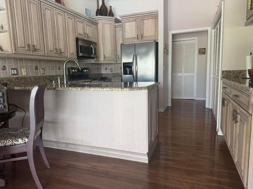 Photo of 8837 SE Marina Bay Drive, Hobe Sound, FL 33455 (MLS # R11136303)