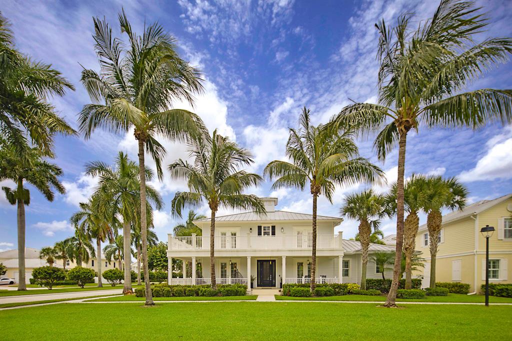 Come home to an HGTV worthy showplace. This home is true perfection in the heart of Jupiter. Carefully reimagined and redesigned this home beams with a modern farmhouse flare. You are immediately welcomed by the new, custom front door which floods the room with natural light. Notice the detail in the designer ceiling features and moldings. Enjoy expansive wood-look, plank tile floors throughout the first-floor offering durability and beauty. The kitchen is an entertainers dream featuring new high-end custom cabinetry, new WOLF commercial appliance package including an additional beverage fridge and double convection ovens. Enjoy the extra thick quartz countertops and an 8'X8' custom island plus, new apron farmhouse sink and faucet hardware. This home is expansive and flows very well.