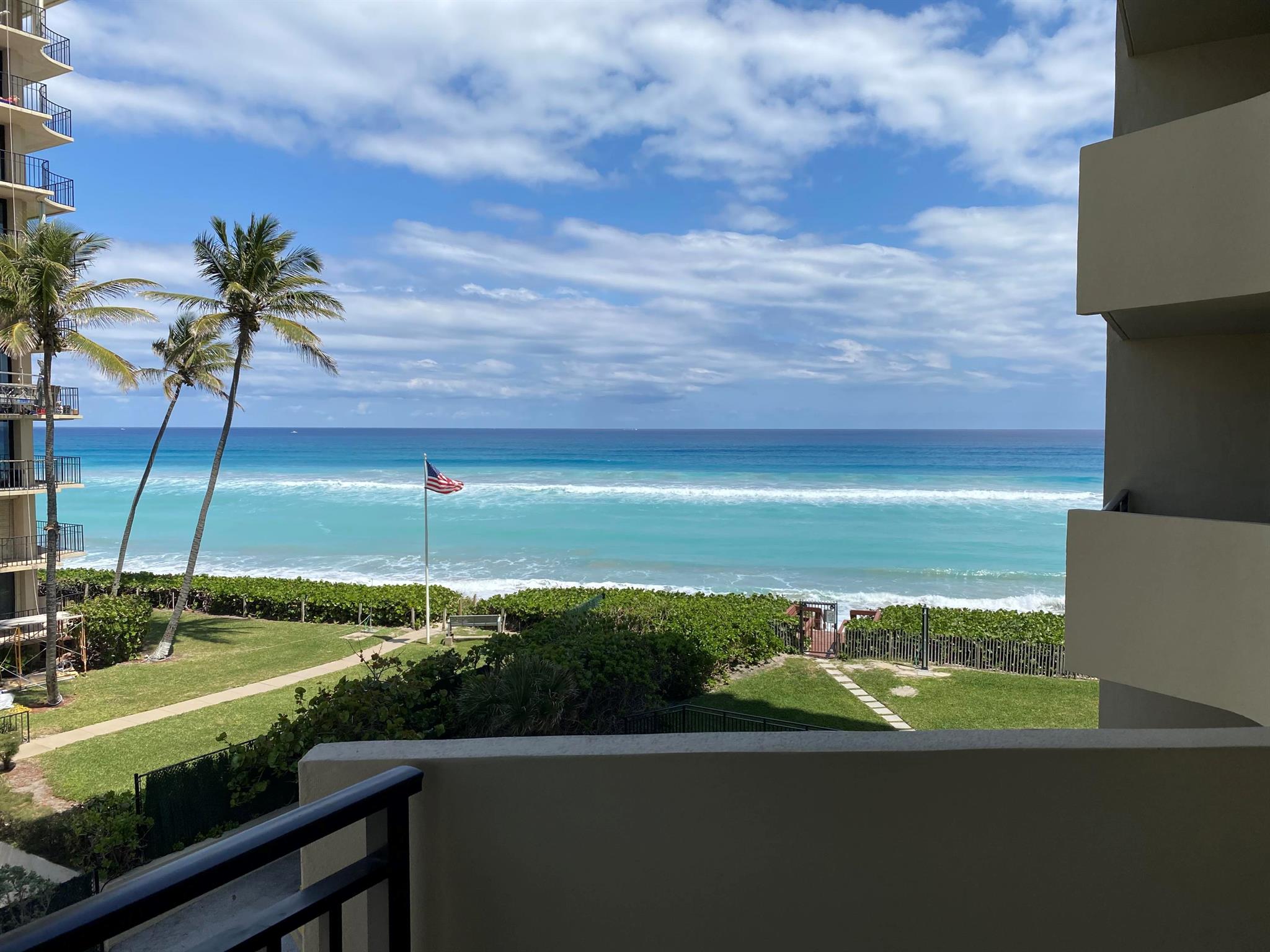 Beautifully updated condo with ocean and wide intra-coastal views! Light and bright living space with a spectacular kitchen featuring tons of updated cabinetry, a huge cooking island, granite counters & high-end stainless appliances. Separate dining areas off the kitchen & living room all open to covered balconies with expansive water views - perfect for entertaining and everyday seaside living! The spacious master suite includes its own private balcony and has a large walk-in custom closet while the master bathroom boasts dual vanities and a recently renovated marble shower. The 2nd bedroom suite also has an updated bathroom, closet and private balcony. Hurricane impact glass sliding doors, designer fixtures & window treatments. Great amenities and on private North end of Singer.