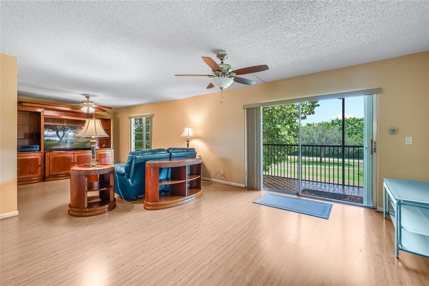 RARE PHASE 6, 1,570 SF 2BR/2BA + DEN THAT CAN BE 3RD BEDROOM, HUGE Wide Open eat-in- kitchen. Washer/Dryer. Furnished. 14th Green Par 3 Golf View. Quiet cul-de-sac with North/South exposure.  Short walk to Pool and BBQ.  Large walk in closets, Large wrap-around balcony. FREE golf (except cart fees) on two 18 hole courses (PGA & Par3); Amenities include Restaurant, Billiard Room, Bbq/Picnic Area, Clubhouse, Courtesy Bus, Exercise Room, Heated Pool, Library, Putting Green, Sauna, Shuffleboard, Tennis, Pickle Ball, Vehicle Wash Area, Electric Car Charging Station. Close to shopping, dining & highways. 15 minutes to the beach. Active 55+ age required community. SPACIOUS THIRD FLOOR screened patio off living room & master bedroom. Close to Tennis and Pool/BBQ area.  BEAUTIFUL AND MOVE-IN READY!