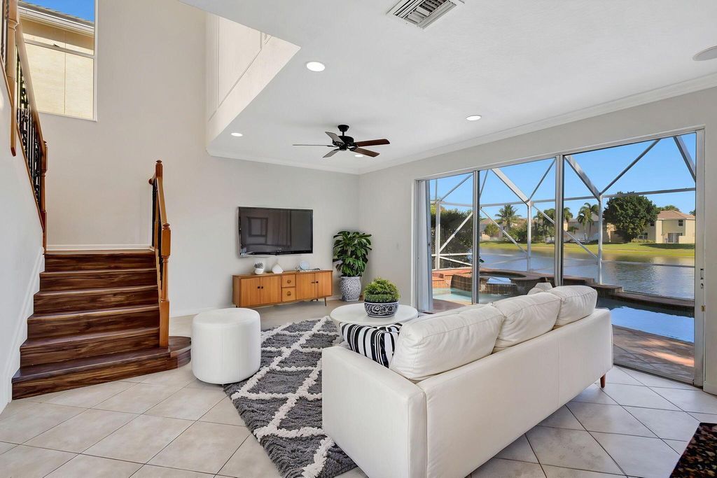 Photo of 119 Canterbury Place, Royal Palm Beach, FL 33414 (MLS # R11080352)