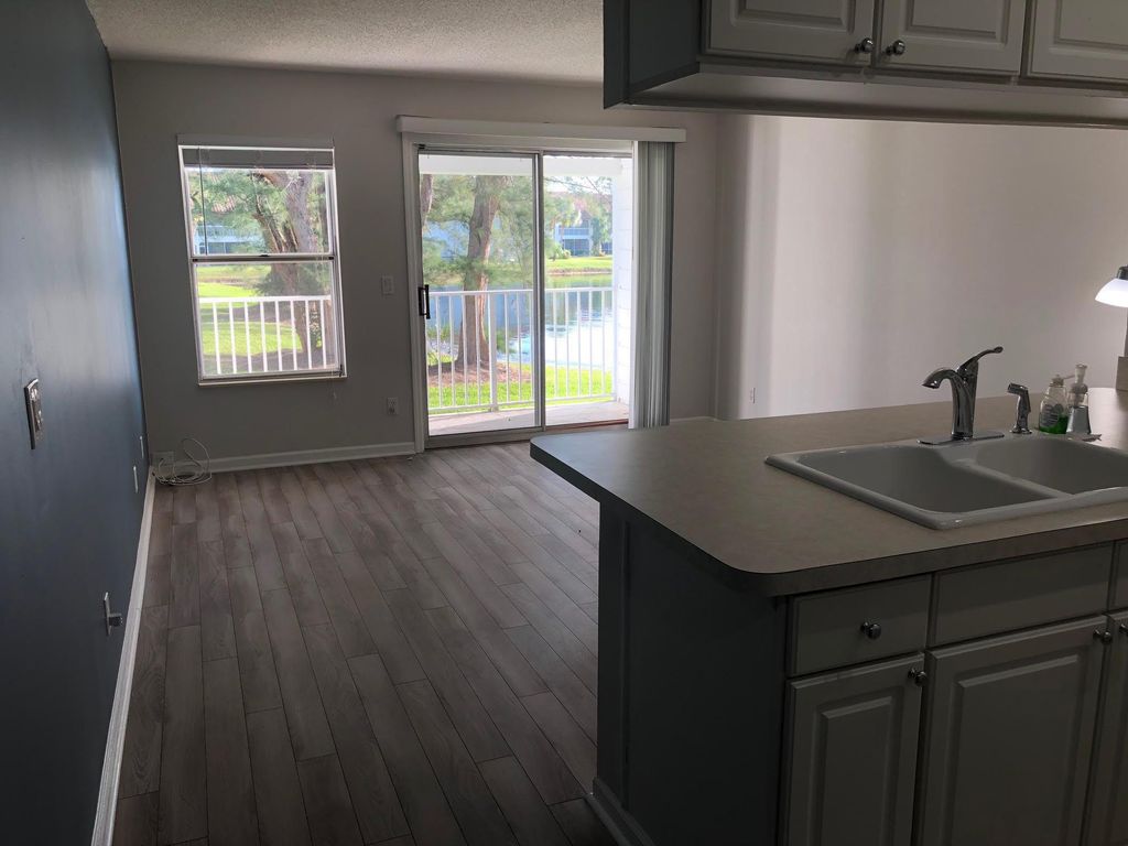 Photo of 150 Cypress Point Drive, Palm Beach Gardens, FL 33418 (MLS # R11116457)