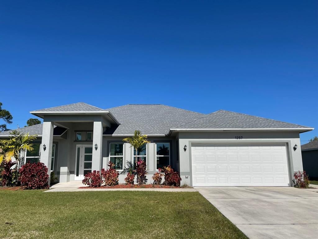Photo of 1257 SW Emerald Avenue, Port Saint Lucie, FL 34953 (MLS # R10766488)
