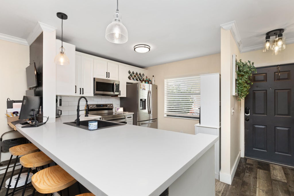 Photo of 761 NW 106th Avenue, Pembroke Pines, FL 33026 (MLS # B26066516)