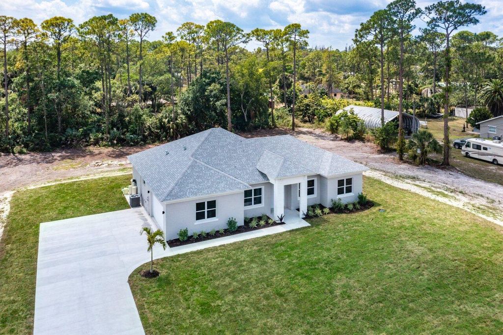 Photo of 16242 E Yorkshire Drive E, Loxahatchee, FL 33470 (MLS # R10790719)