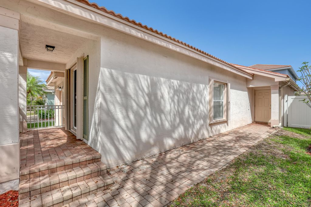 Photo of 5033 Northern Lights Drive, Greenacres, FL 33463 (MLS # B26004636)