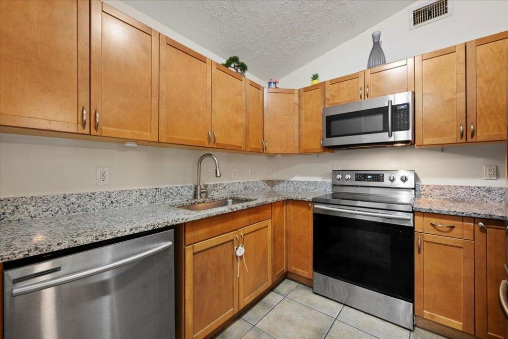 Photo of 6015 Raintree Trl, Fort Pierce, FL 34982 (MLS # R11101121)