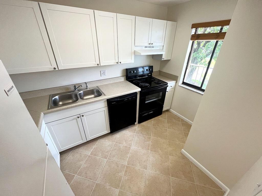 Photo of 2828 Tennis Club Drive #207, West Palm Beach, FL 33417 (MLS # R11155767)