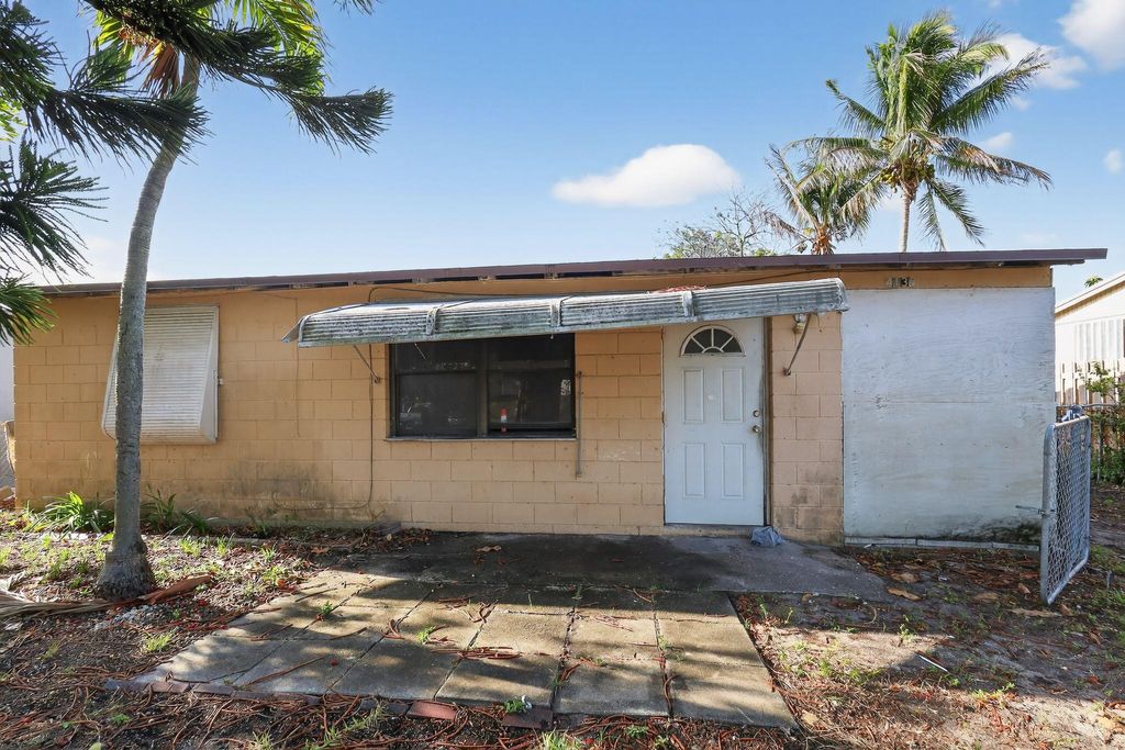 Photo of 4138 Faith Street, West Palm Beach, FL 33406 (MLS # B26003574)