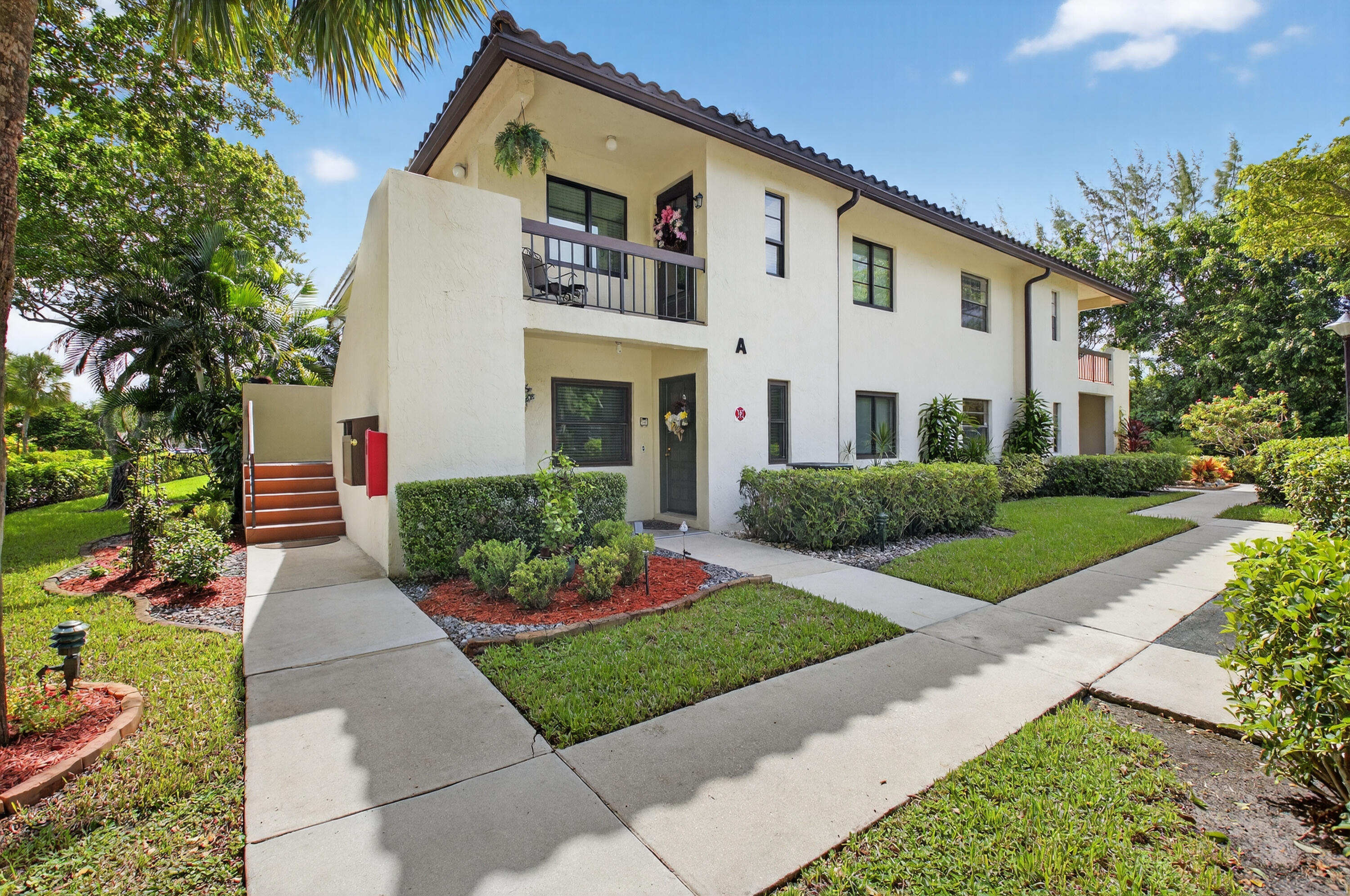 This meticulously maintained and move-in-ready corner unit condo in The Glades of Boca Lago offers both comfort and style in a manned, gated community. Featuring hurricane impact windows, lush landscaping, a bright open layout, with a huge pantry and tons of storage, this home is designed for peace of mind and easy living. Enjoy private stairs leading directly to your unit with a serene view of the community pool. With only four residences in this building--a rare feature not found in others--you'll appreciate the extra privacy and exclusivity. Ideally located near top shopping, dining, and schools, this condo is the perfect blend of convenience and tranquility.Optional Memberships are available.