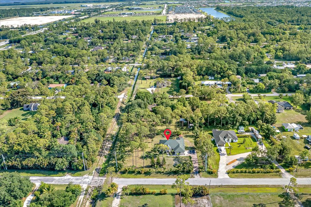 Photo of 16133 E Lancashire Drive, The Acreage, FL 33470 (MLS # R11136065)