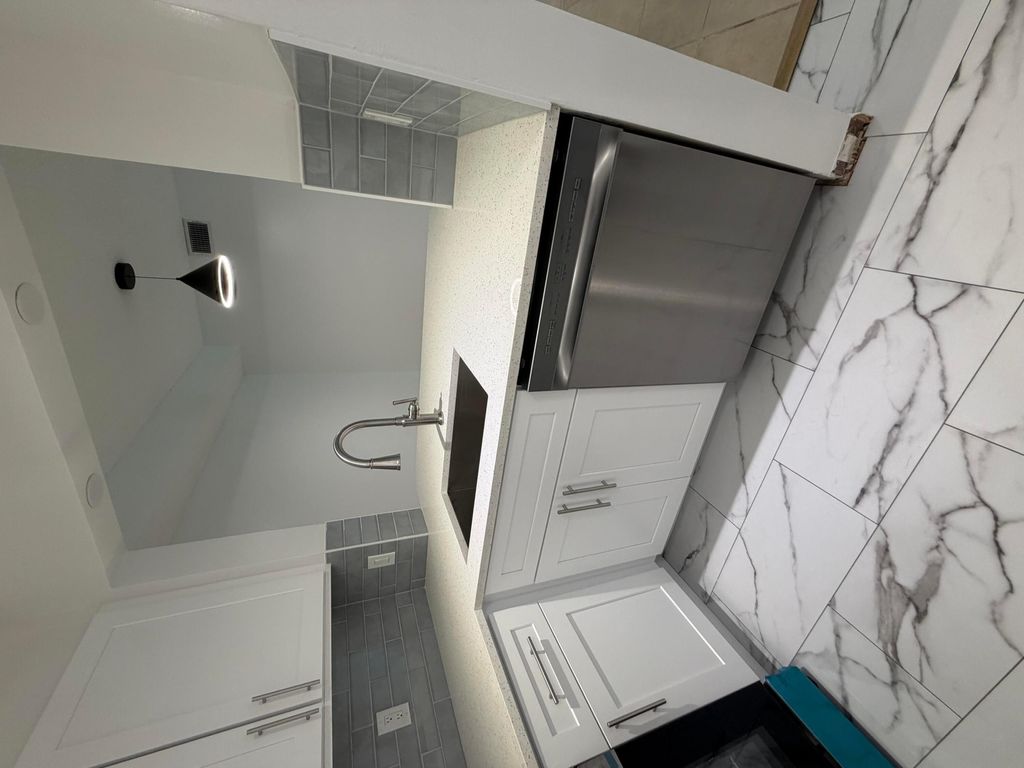 Photo of 13811 Oneida Drive #E1, Delray Beach, FL 33446 (MLS # B26014021)