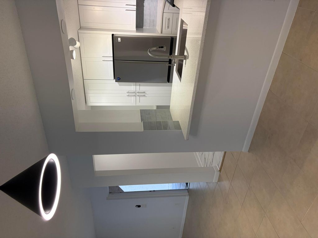 Photo of 13811 Oneida Drive #E1, Delray Beach, FL 33446 (MLS # B26014021)