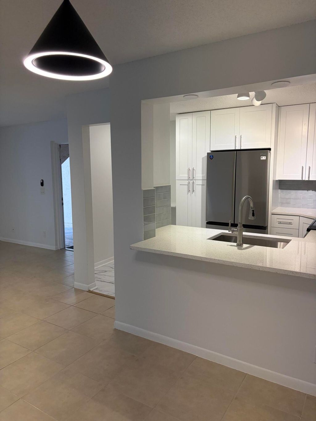 Photo of 13811 Oneida Drive #E1, Delray Beach, FL 33446 (MLS # B26014021)