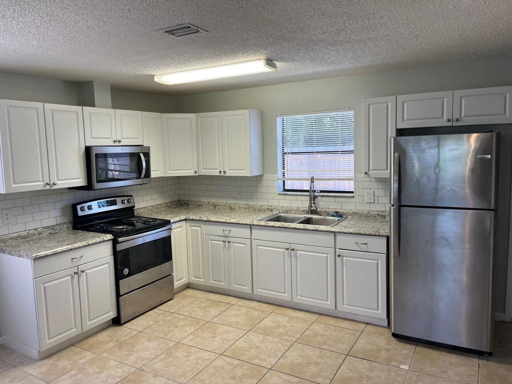 Photo of 265 NE 12 Street, Delray Beach, FL 33444 (MLS # R11125264)