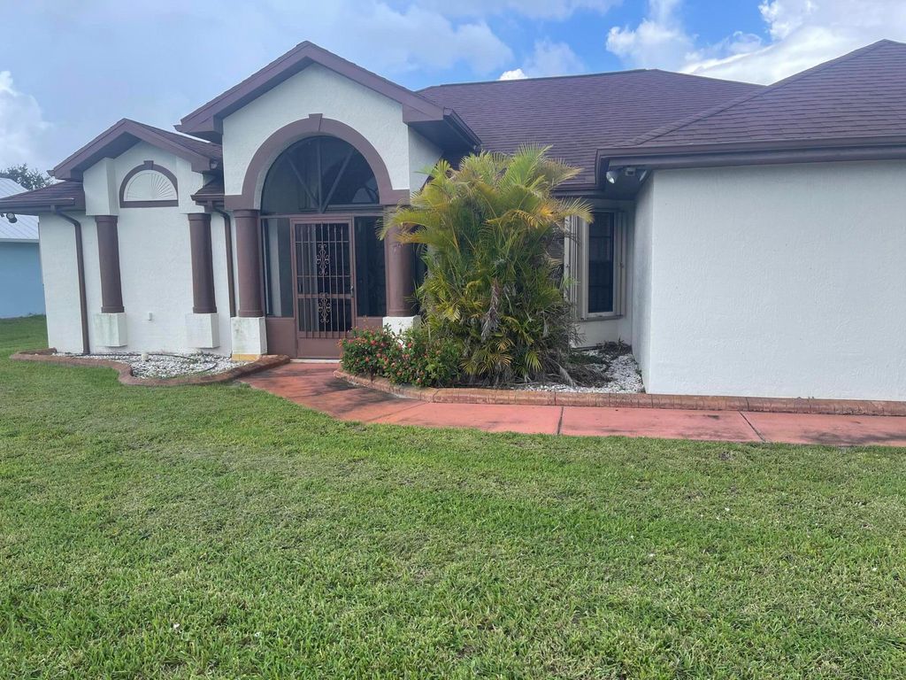 Photo of 3128 SE Card Terrace N, Port Saint Lucie, FL 34984 (MLS # R11098732)