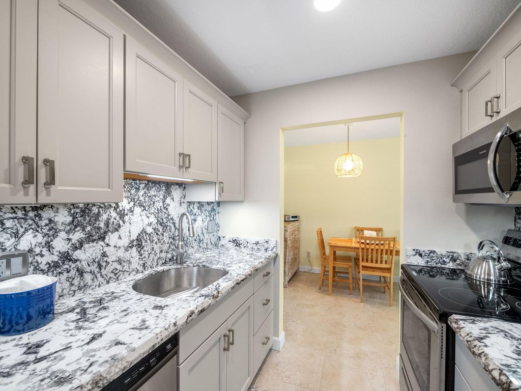 Photo of 131 Doolen Court #103, North Palm Beach, FL 33408 (MLS # R11087388)