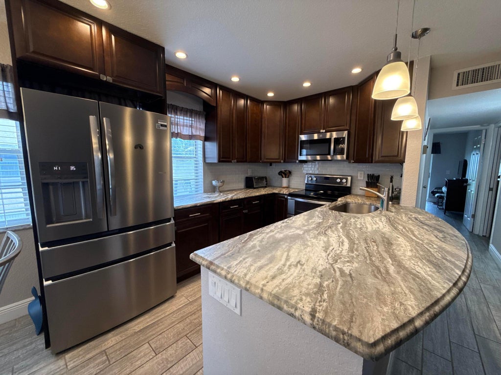 Photo of 29 FLANDERS A, Delray Beach, FL 33484 (MLS # B26058795)
