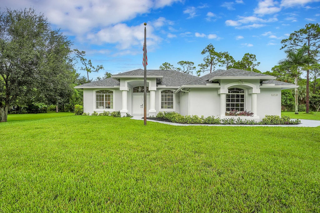 Photo of 12315 63rd Lane N, The Acreage, FL 33412 (MLS # R11014666)