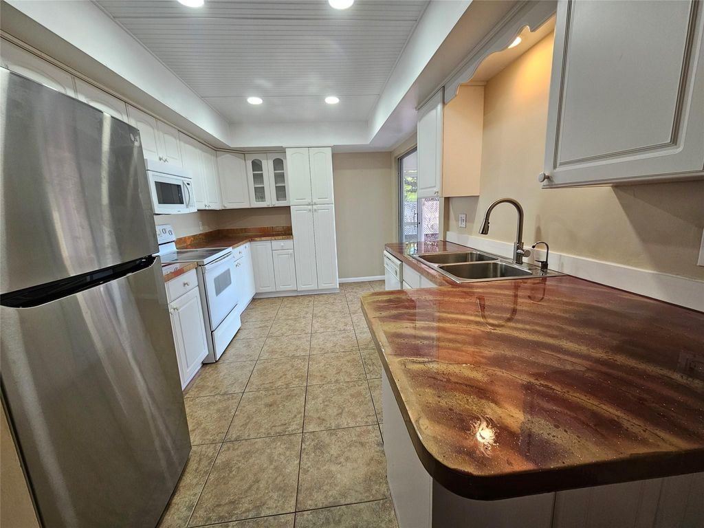 Photo of 612 N Coconut Avenue, Port Saint Lucie, FL 34952 (MLS # F10551019)