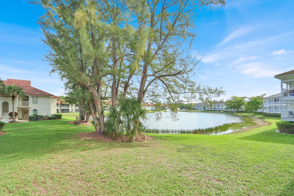 Photo of 149 Cypress Point Drive, Palm Beach Gardens, FL 33418 (MLS # B26010340)