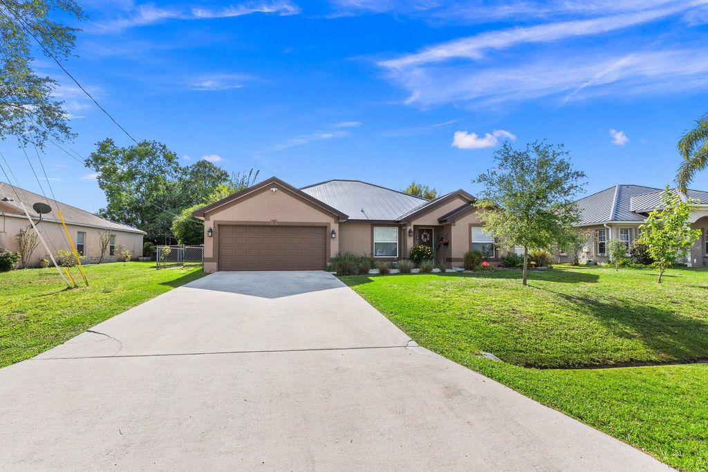 Photo of 6610 NW Omega Road, Port Saint Lucie, FL 34983 (MLS # R11167745)