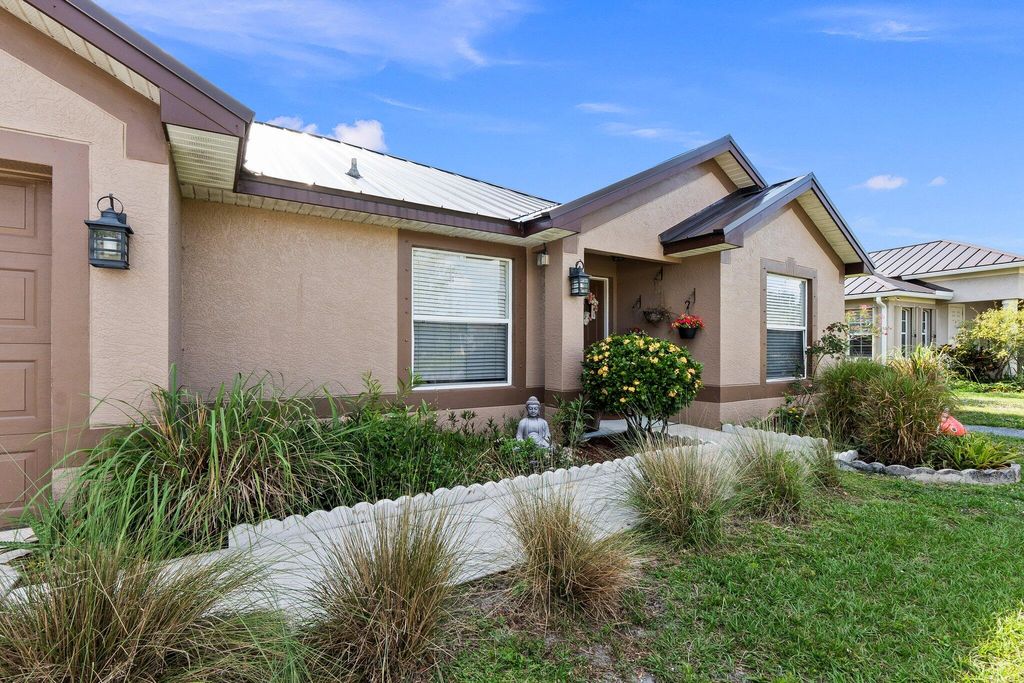 Photo of 6610 NW Omega Road, Port Saint Lucie, FL 34983 (MLS # R11167745)