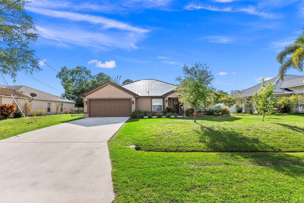 Photo of 6610 NW Omega Road, Port Saint Lucie, FL 34983 (MLS # R11167745)