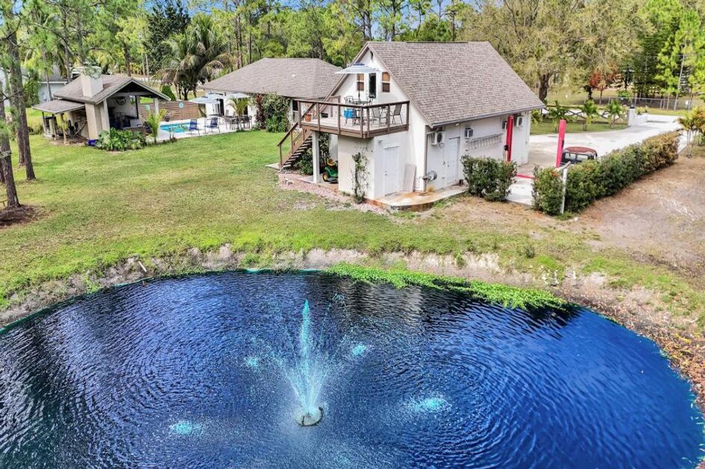 Photo of 14648 88th Place N, The Acreage, FL 33470 (MLS # B26042576)