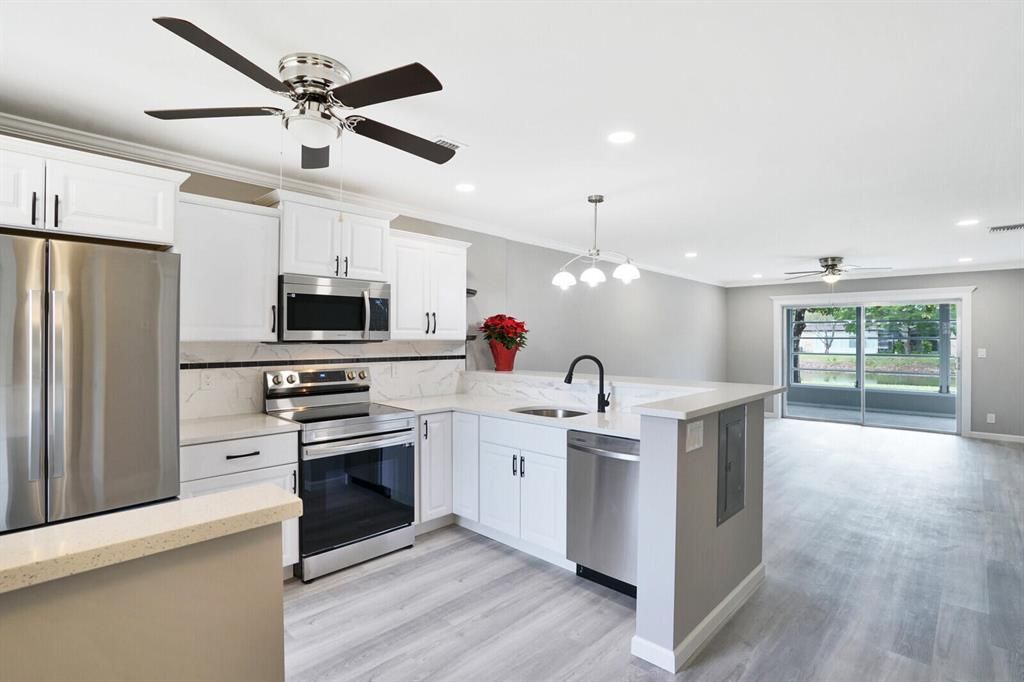 Photo of 179 Lake Susan Lane, West Palm Beach, FL 33411 (MLS # R10857655)