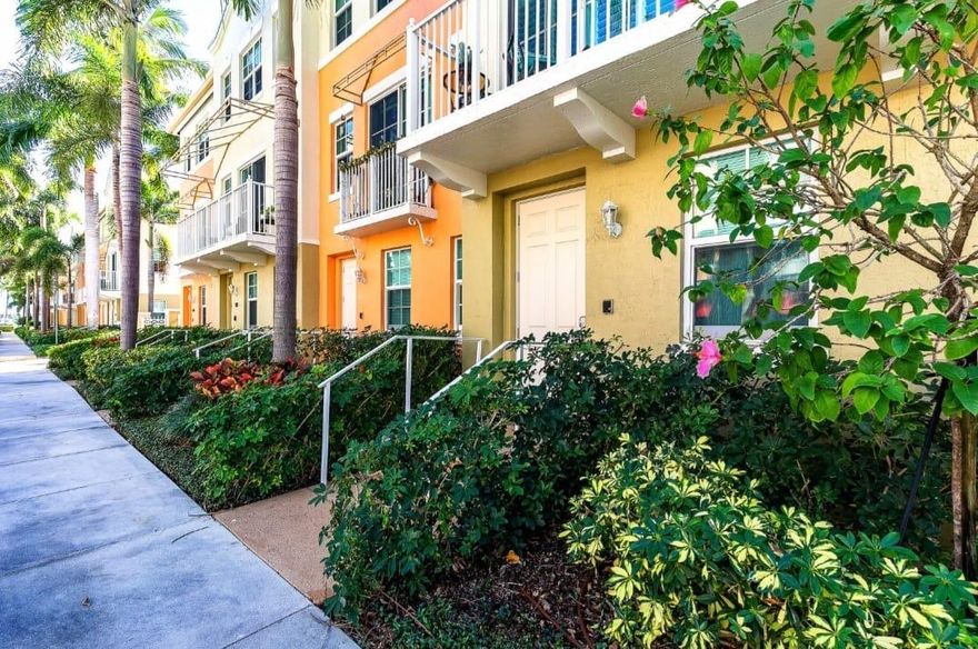 Step into true coastal living at The Moorings at Lantana. This 3-bedroom, 3-bath, three-story townhouse with a two-car garage offers the ideal blend of flexibility, space, and lifestyle.  The layout is a major highlight. Upon entry, you'll find a private bedroom and full bathroom on the first floor—perfect for guests, a home office, or multi-generational living—along with direct access to the garage. Head upstairs to the main living level where the space opens up into a bright kitchen and living area, designed for entertaining and everyday comfort. The kitchen features stainless steel appliances, a built-in refrigerator, and a cozy breakfast nook. Just off the living area, a private balcony invites in the coastal breeze and adds that perfect indoor-outdoor feel.   The top floor offers two spacious bedrooms, each with its own private en-suite bathroom, creating a true retreat-style setup with privacy for everyone.  Location is everything—just minutes to the Intracoastal, beaches, shopping, and dining. For boaters, you're next to Loggerhead Marina with convenient boat storage and quick access to the water.  The Moorings delivers a full resort-style experience with two pools, two spas, fitness center with sauna, club room, business center, marina, and on-site retail, plus a future waterfront restaurant. Surrounded by lush tropical landscaping, the community feels like a private getaway.  INVESTOR FREINDLY NEIGHBORHOOD! RENT AS SOON AS YOU CLOSE.   146 Moorings Dr delivers lifestyle, flexibility, and energy—exactly what today's buyers are looking for.