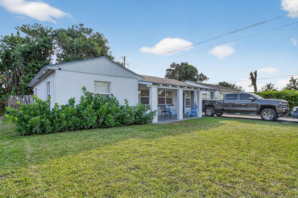 Photo of 173 W 18th Street, Riviera Beach, FL 33404 (MLS # R11142554)