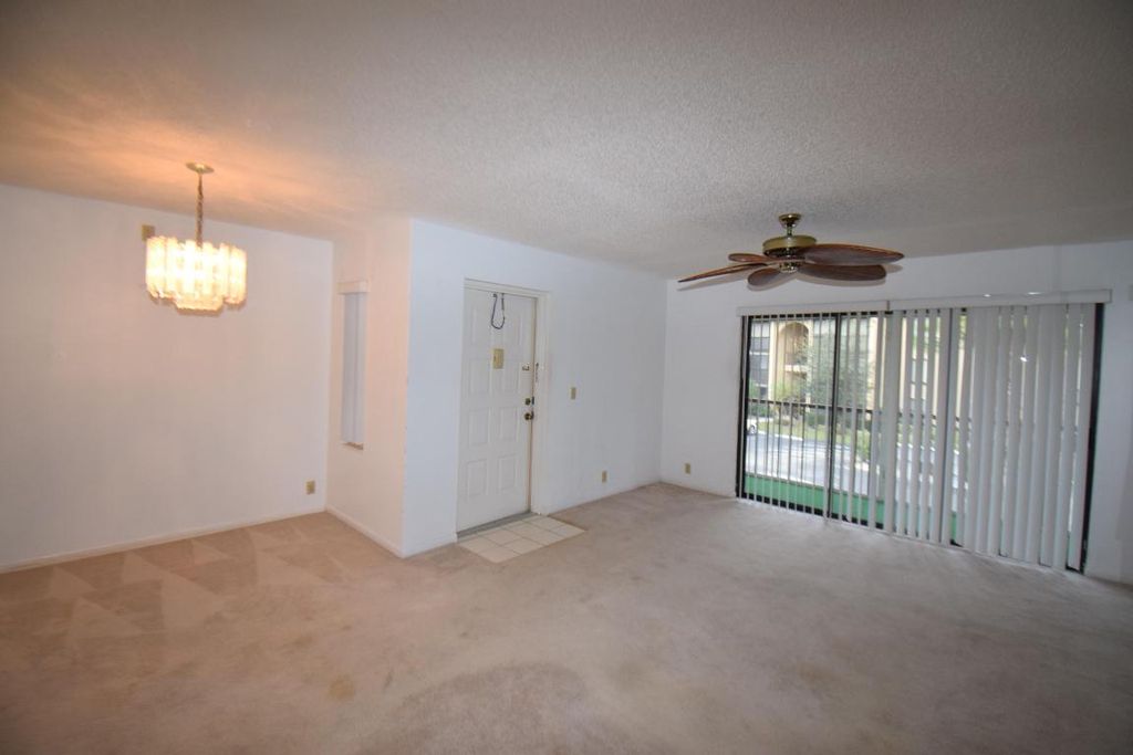 Photo of 815 Sky Pine Way #C2, Greenacres, FL 33415 (MLS # R11158733)