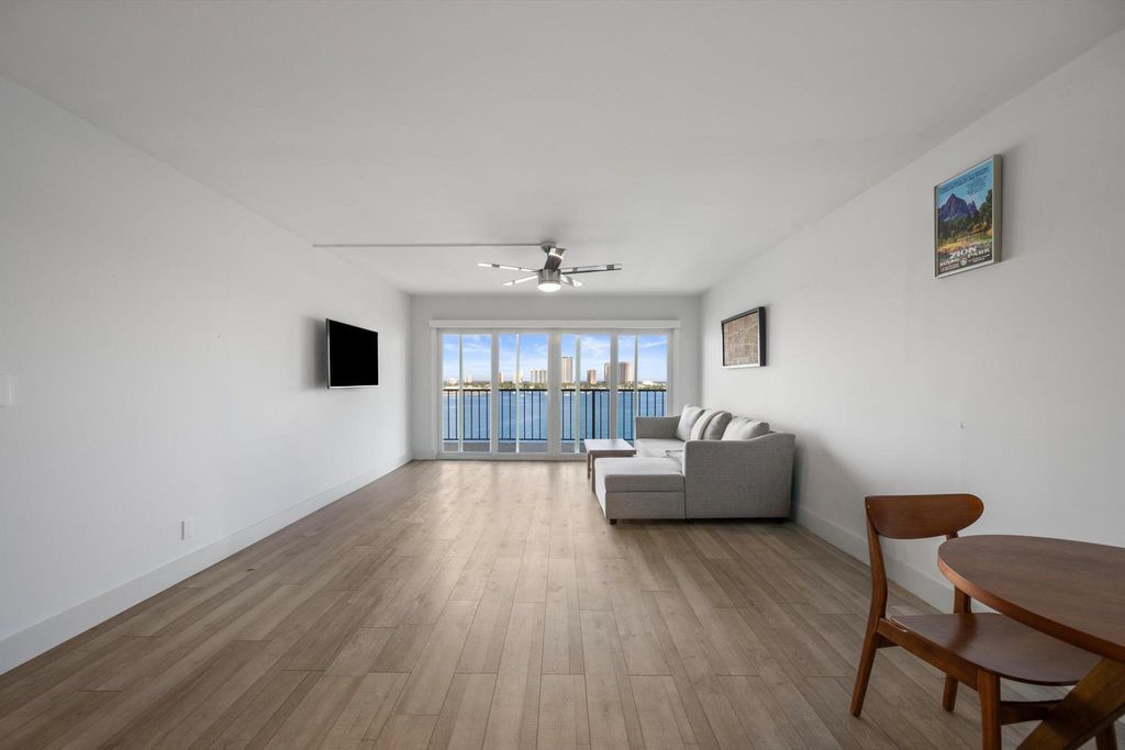 Photo of 3040 Lake Shore Drive #Ph 2, Riviera Beach, FL 33404 (MLS # R11142625)