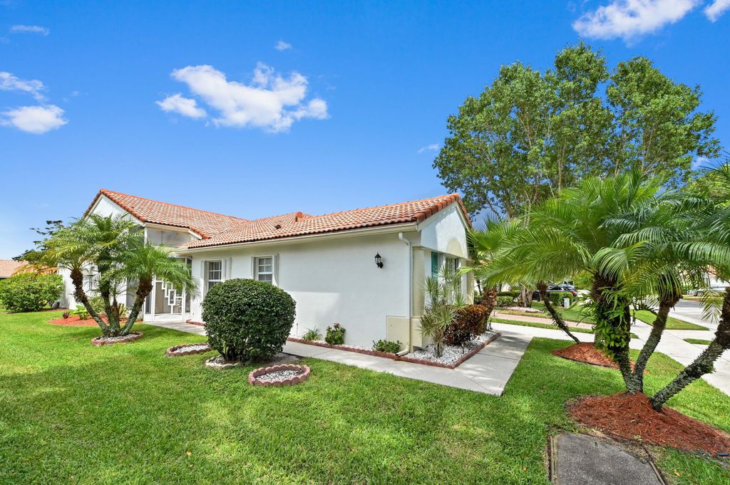 Photo of 6077 Lake Hibiscus Drive, Delray Beach, FL 33484 (MLS # B26015603)