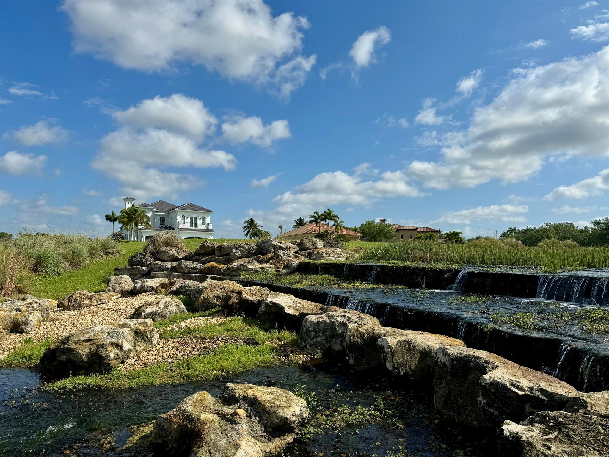 Have you ever imagined a waterfall in your backyard? This Tesoro Home site, with its 270-degree views of the Palmer 5th Golf Hole, a 500-yard-long lake, and a waterfall, offers you the chance to bring that vision to life. As the new owner of this property, you have the power to decide on your residence's design with one of Tesoro's approved builders. Tesoro's design guidelines cater to the tastes of today's most discerning designers and home buyers. Membership in the Tesoro Club is strictly voluntary with ownership of the building site and the property has no building timeframe. Being part of the private, manned, gated golf community of Tesoro, an appointment is necessary to view the site. This unique location is yet to be assigned an address, so call the agent to arrange a viewing.