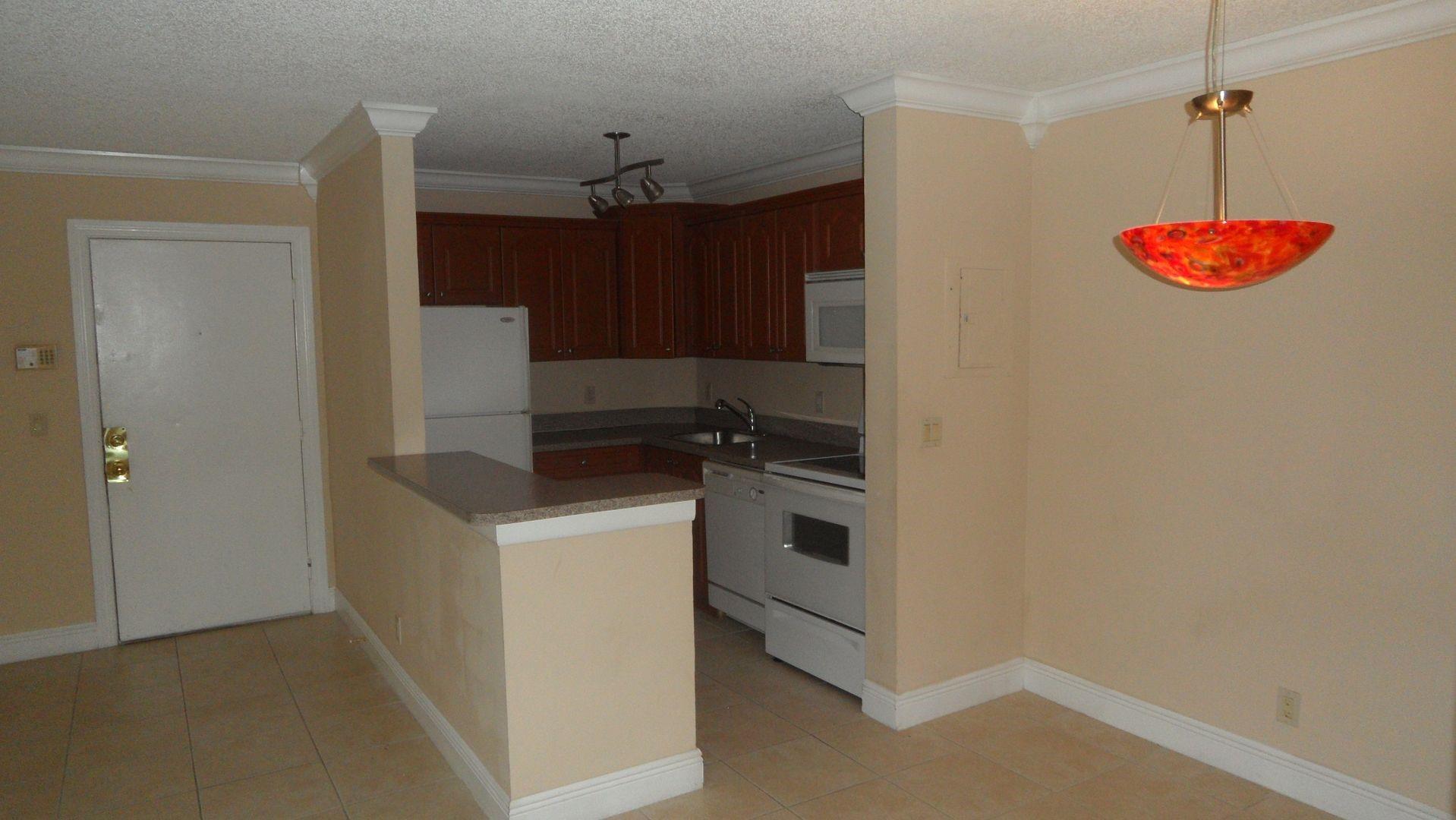 Nice and Clean 2 Bad/2 Bath, 1st Floor, open balcony with a great lake view. Located At Lakes of Jacaranda - A Great Complex in the heart of Plantation. Features Tile floors, Updated Kitchen, In Unit washer and dryer. Great family environment included a Clubhouse, Tennis Courts, 2 Pools, and more. across the street from Central Park Elementary School, Publix, Restaurants, Sawgrass Mill, Highway 595, and 75. Clubhouse, pools, fitness room, tennis, and much more.