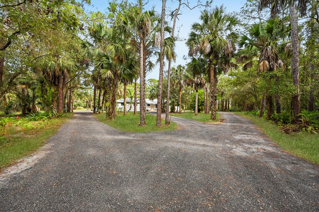 Photo of 5225 SW Ludlum Street, Palm City, FL 34990 (MLS # F10539919)