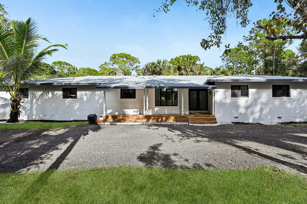 Photo of 5225 SW Ludlum Street, Palm City, FL 34990 (MLS # F10539919)