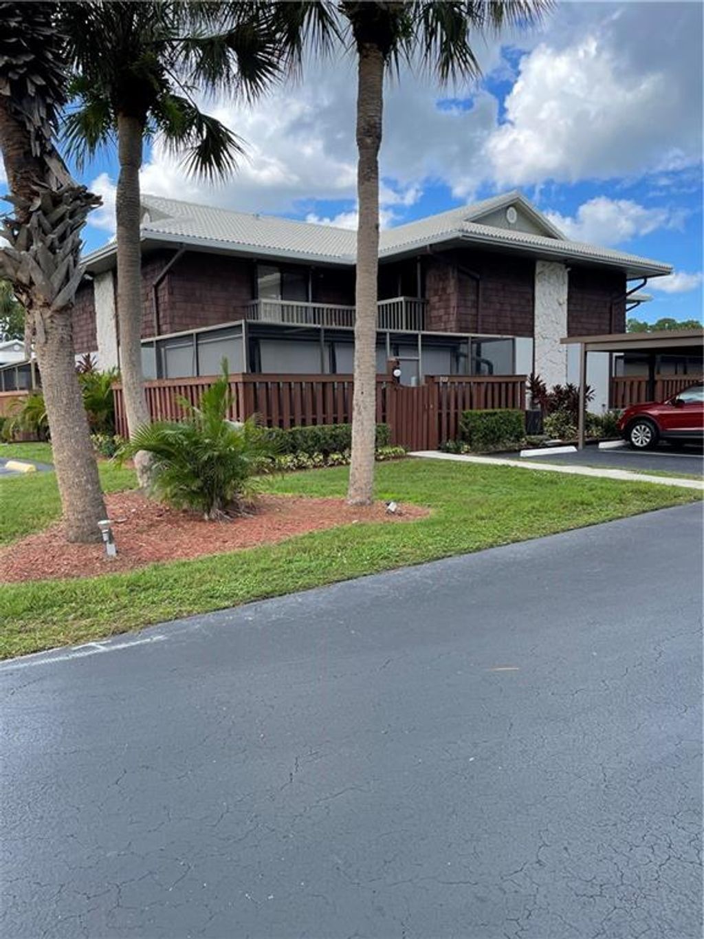 Photo of 702 SE Camelot Gardens Blvd #B, Port Saint Lucie, FL 34952 (MLS # F10307623)