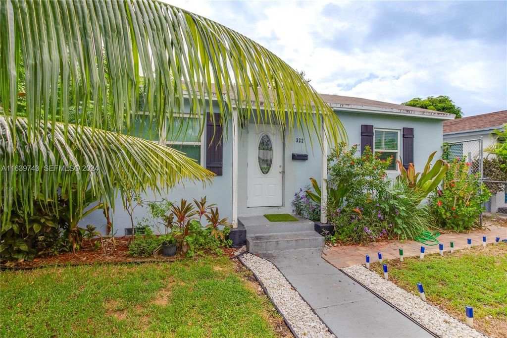 Photo of 322 N C Street, Lake Worth Beach, FL 33460 (MLS # B26031757)