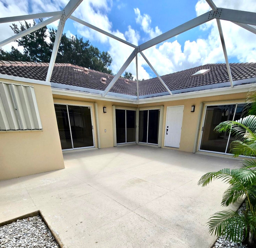 Photo of 9181 SUN TERRACE Circle #A, Palm Beach Gardens, FL 33403 (MLS # B26088928)