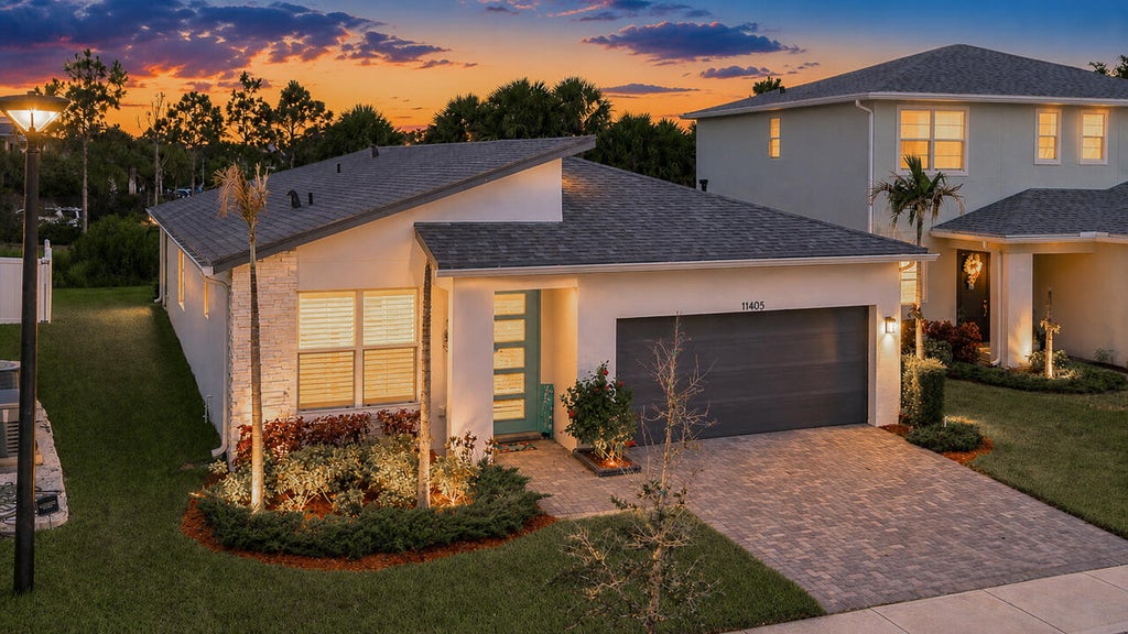Photo of 11405 SW Lyra Drive, Port Saint Lucie, FL 34987 (MLS # B26038573)
