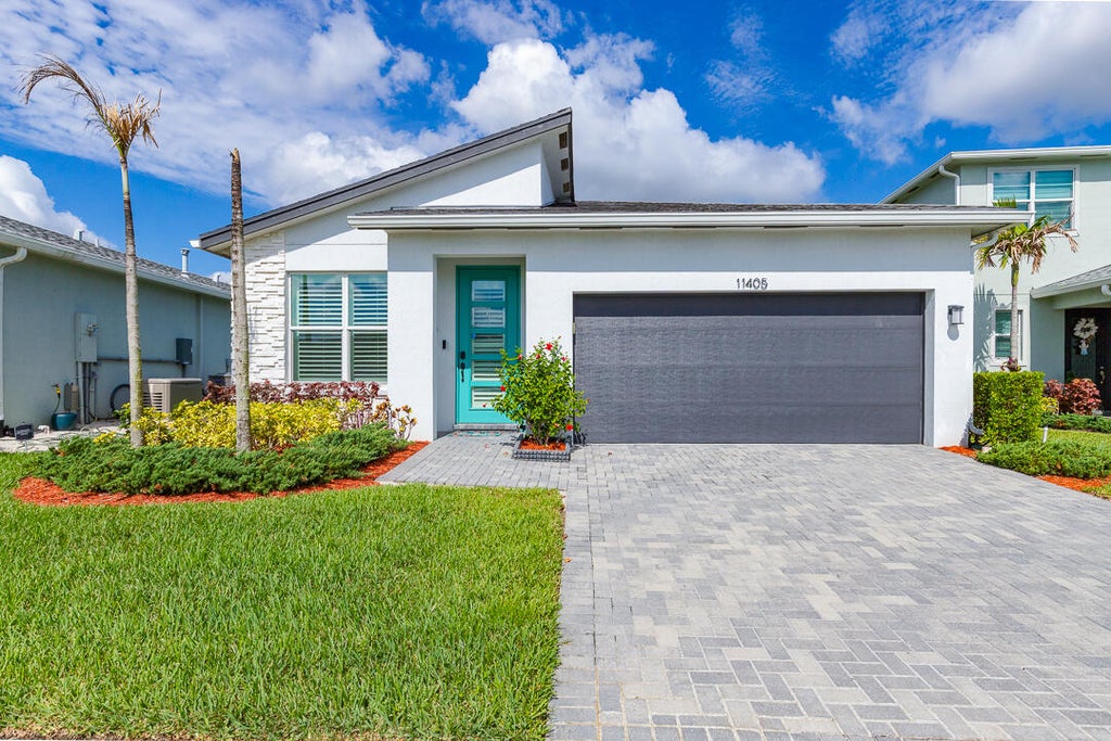Photo of 11405 SW Lyra Drive, Port Saint Lucie, FL 34987 (MLS # B26038573)