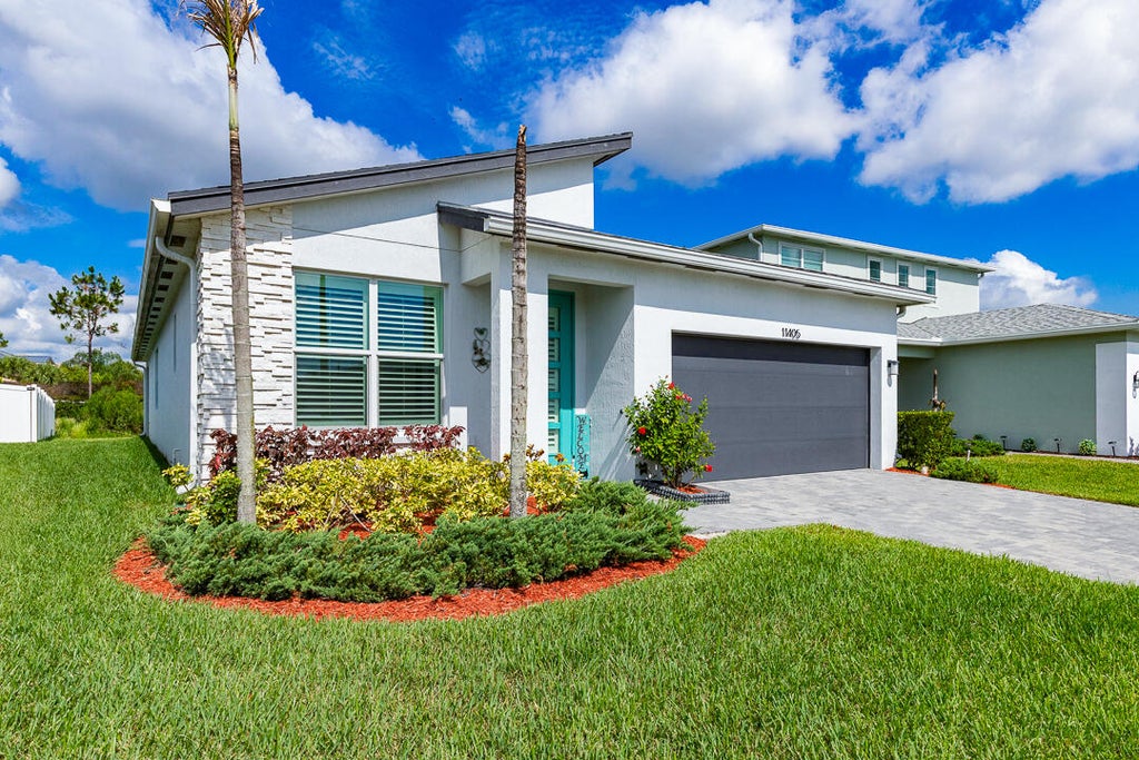 Photo of 11405 SW Lyra Drive, Port Saint Lucie, FL 34987 (MLS # B26038573)